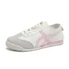 Zapatillas de entrenamiento alemanas para mujer 2026 nuevos zapatos populares de primavera y otoño zapatillas versátiles de suela plana estilo Forrest Gump zapatillas deportivas casuales