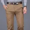 Pantalones Casuales Gruesos de Algodón Puro Talla Grande para Hombre Otoño e Invierno Negocios Sueltos Rectos Elásticos Pantalones de Hombre Cintura Alta Negros Largos