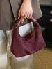 Bolso transfronterizo para mujer, bolso de hombro de moda y tendencia para el día a día, bolso de axila, bolso para lonchera, nuevo bolso tejido versátil y cómodo 2026