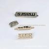 Fábrica personalizado moeda bolsa metal placa de identificação liga de zinco revestimento de retenção de cor etiqueta não-ferrugem etiqueta de logotipo de metal personalizado