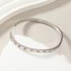 Pulsera de acero de titanio de venta caliente transfronteriza para mujer, versátil con incrustaciones de diamantes, pulsera con hebilla de 10 diamantes, joyería de acero inoxidable de alta calidad