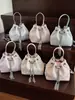 Bolso de Mano Pequeño para Mujer 2025 Nuevo Primavera Bolso Cubo con Cordón Versátil Estampado de Flores Bolso Cruzado con Cadena Ins