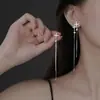 Pendientes de borla de estrella irregular y ear cuffs para mujer, diseño de nicho estilo ins, pendientes de moda y elegantes, accesorios al por mayor