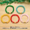 Barraca de ponto cênico vendendo joias feitas à mão com miçangas imitação de jade contas de barril pulseira de vidro atacado masculino e feminino este ano pulseira