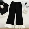 Conjunto de niña 2026 otoño nuevo estilo coreano para niños, top de manga larga con volantes y pantalones acampanados elásticos, conjunto de dos piezas, moderno