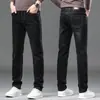 2026 Jeans Masculino Novo Moda Versátil Perna Reta Elástico Outono Tendência Marca Slim Casual Solto Calça Longa