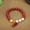 Pulsera de cinabrio rojo al por mayor con alto contenido de arena de oro púrpura de 8 m de cuentas redondas con colgante pulsera de la paz golondrina bestia valiente viva