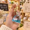 Bolsa de la suerte creativa de arena movediza, bolsa de dinero, llavero con lentejuelas en aceite, botella de deriva oceánica, pequeño regalo para estudiantes, colgante para llaves