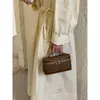 Bolsas pequeñas de color block populares este año para mujer 2026 nuevo bolso cruzado versátil de moda bolso de mano súper popular bolso cuadrado pequeño tipo caja
