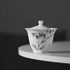 Tazón de té de porcelana blanca pintado a mano bajo vidriado con tapa de jade de sebo National Tide Juego de té Kung Fu traje Bandeja de té de secado rápido para el hogar Venta al por mayor