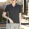 Estilo nuevo de verano algodón puro cuello camisero casual manga corta tejido calado moda torsión delgado corte ajustado camiseta top para mujer