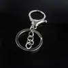Venta al por mayor del fabricante En stock Accesorios para llaveros Hebilla de aleación de cuero Llavero de cuero para coche de metal para hombre Llavero de cuero