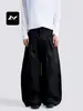 Con una rica hoja occidental curva simple retro americana para hombres y mujeres pantalones de pierna ancha diseño de pliegues holgados sentido de diseño corte tridimensional