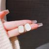 Pendientes geométricos ligeros de lujo de alta gama con esmalte francés, nuevos y modernos de 2023, pendientes únicos de nicho para mujer, venta al por mayor