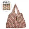 2025 Nueva Bolsa de Compras Plegable Tela Floral Portátil Poliéster Tote Bolsa de Almacenamiento Gran Capacidad Bolsa para la Compra del Supermercado Venta al por Mayor
