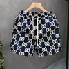 Nuevos shorts casuales de verano sueltos con estampado floral para hombre, marca de moda, shorts finos de playa, shorts deportivos estilo americano