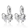 Suministro directo transfronterizo aretes de acero inoxidable con incrustaciones de diamantes para mujer, aretes de flor y moño de moda, accesorios para orejas sin perforación, joyería de lujo ligero