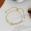 Joyería de Mano Personalizada para Mujer con Baño de Oro Real y Circonita, Pulsera Ajustable Deslizante Geométrica de Cubo de Azúcar con Piedra Ojo de Gato de Alta Gama