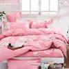 Estudante lixando lençol de cama de dormitório de quatro peças capa de colcha travesseiro estudante lençol de várias peças dormitório Kit de presente de três peças