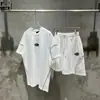 Marca de moda estilo americano SYNA WORLD Traje de manga corta estilo taladro High Street Hip Hop Ins Verano Pantalones cortos casuales para hombres y mujeres
