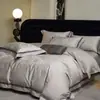 Conjunto de jacquard Tencel de algodão em tom escuro de 100 fios de luxo com brocado cintilante, conjunto de quatro peças de algodão puro para quartos modelo de vilas com um toque de alta qualidade