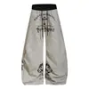 Calça de moletom com estampa de letras estilo American Gothic da moda, listrada color-block, perna curva, unissex, estilo high-street, modelagem solta, calça casual de perna larga