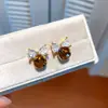 Pendientes de borla con carcasa de madera marrón transfronterizos europeos y americanos, pendientes de estilo vintage Maillard, pendientes de mujer de lujo ligero de alta gama