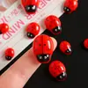 Accesorios de resina de animal mariquita roja de dibujos animados para manualidades DIY con pegamento de crema, fundas de teléfono, hebillas de zapatos y materiales para accesorios para el cabello