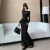 Traje de una sola manga estilo chica picante transfronterizo francés 2026 otoño nueva moda top corto falda de sirena de cintura alta adelgazante