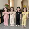 Conjunto de Duas Peças Calça Flare Infantil Casual para Meninas Verão 2026 Novo Lindo Laço Camiseta de Manga Curta