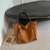 Bolso de mujer de gran capacidad, elegante y estéticamente agradable, nueva colección 2026, bolso tote retro para el día a día, bolso de hombro simple de color sólido