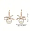 Pendientes rojos de temperamento de alto nivel con lazo pendientes de diamante de moda en internet con personalidad pendientes de regalo conmemorativo creativo