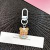 Llavero con forma de oso de mantequilla, colgante para bolso, pequeño accesorio de regalo, llavero para mochila escolar, accesorios para pareja, bonito