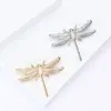 Broche de libélula calado de aleación esmaltada europeo y americano de gran venta transfronteriza, pin de joyería elegante para solapa de traje de dama