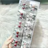 Pinza para el cabello con forma de fresa y lazo de pedrería estilo coreano de lujo ligero para niñas, pasador lateral, accesorio para el cabello al por mayor