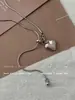 ¡De moda! Collar Sencillo con Colgante de Corazón de Plata para Mujer, Cadena Larga de Suéter de Lujo Ligero de Alta Gama para Primavera y Verano