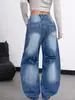 Comercio exterior transfronterizo artículos de liquidación europeos y americanos de Amazon jeans lavados en azul con dobladillo curvo pantalones banana holgados cónicos para mujer