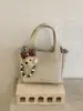 Bolso Cubo Portátil Súper Popular para Mujer 2026 Nueva Moda Versátil Bolso de Hombro Cruzado Bolso de Mano de Alta Gama para Viajes Diarios