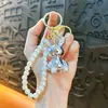 Llavero Creativo de Cadena de Perlas de Conejo de Diamante Colgante Lindo para Bolso Llavero de Llaves de Coche Agarrador Pequeño Regalo Venta al por Mayor