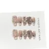 Puntas de uñas rosas hechas a mano de alta gama con un estilo suave, europeo y americano, con diseños de corazón, lazo y oso