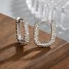 Pendientes plisados con textura de lava ovalada geométrica, diseño para niñas, estilo dulce, fresco, único y frío, hebilla de oreja coreana simple.