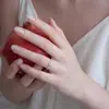 Suministro para transmisión en vivo de TikTok: Anillos de moissanita color H para mujer, plata de ley, un quilate, varios estilos, engaste de seis garras, venta al por mayor directamente del fabricante