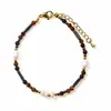 Diseño original pulsera de perla de agua dulce natural ojo de tigre piedra de vesícula negra pulsera brazalete versátil de alta gama al por mayor