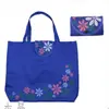 Fábrica para bolsa de mano impermeable de tela Oxford para regalos, bolsa de compras plegable de moda colorida con flores, bolsa de almacenamiento de protección ambiental portátil