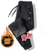 Venta al por mayor de fábrica pantalones largos de invierno gruesos con forro polar de terciopelo no invertido pantalones casuales pantalones de chándal para hombre pantalones deportivos para hombre con tobillo fruncido