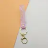 Chaveiro Pingente Corda de Couro Transparente Feliz Acessórios de Borracha Macia PVC Acessórios para Chaveiro Atacado