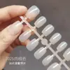 Uña pieza de uña color sólido brillante nude usando una uña prefabricada pasta completa para extender la pieza de uña postiza una generación de cabello
