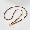 Versátil collar de cuentas de piedra natural ojo de tigre, un accesorio para mujer para suéteres de otoño e invierno, una pieza de joyería larga, ligera y lujosa