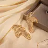 Pendientes de Hoja Estilo Minimalista Retro Transfronterizos Europeos y Americanos para Mujer, Pendientes de Flor de Metal con Diseño de Moda