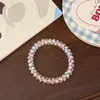 Goma para el pelo de cordón de teléfono plateada minimalista, estilo nicho de alta gama, dulce y genial para chicas a la moda, accesorio para el pelo que no daña